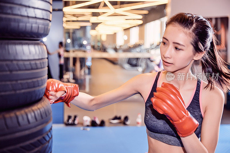 Fitness girl working out in a gym